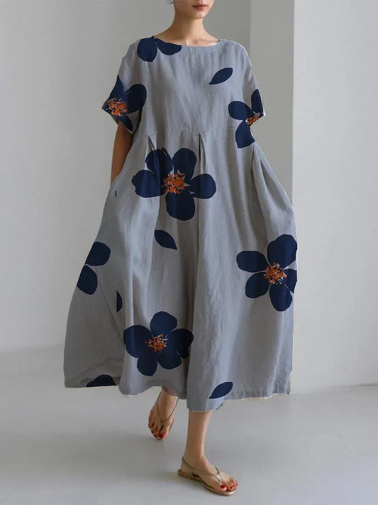 RAFFAELLA | Longue robe florale à la coupe décontractée et aux détails élégants pour les journées chic